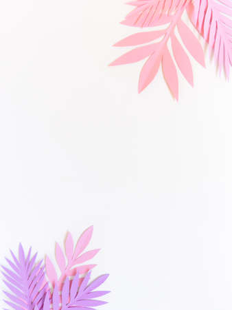 Summer background with colorful paper tropical leaves.の写真素材
