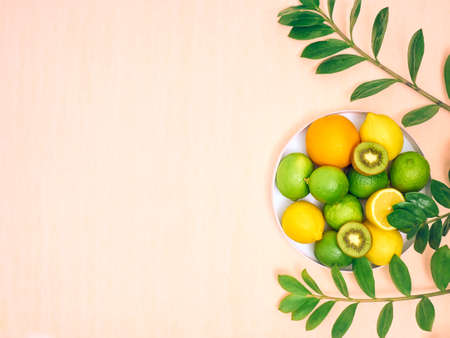 Composition with citrus fruits on blue background, top view.の写真素材