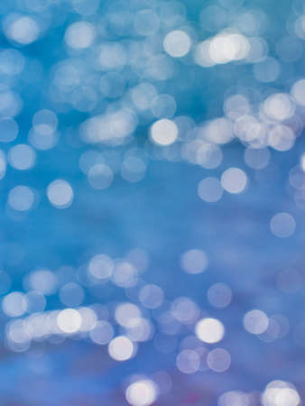 Background of bokeh on surface water.の写真素材