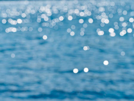 Background of bokeh on surface water.の写真素材