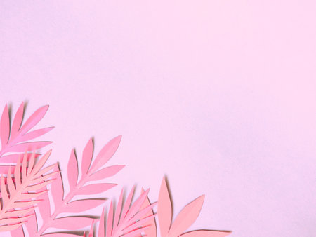 Summer background with colorful paper tropical leaves.の写真素材
