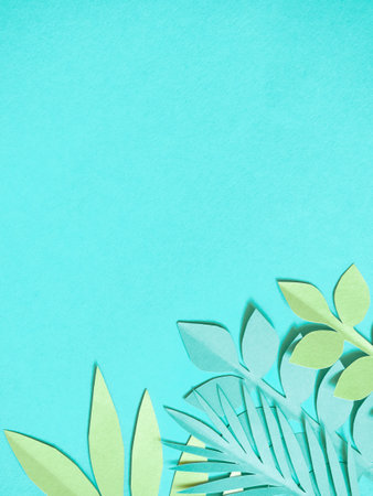 Summer background with colorful paper tropical leaves.の写真素材