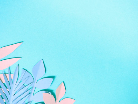 Summer background with colorful paper tropical leaves.の写真素材