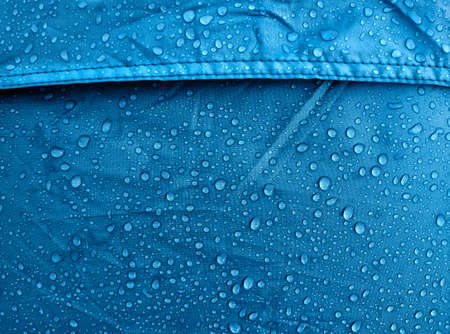Water drops on waterproof membrane fabric. Morning dew on tent.の写真素材