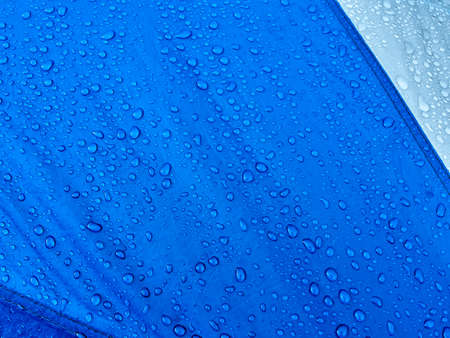 Water drops on waterproof membrane fabric. Morning dew on tent.の写真素材
