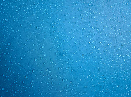 Water drops on waterproof membrane fabric. Morning dew on tent.の写真素材