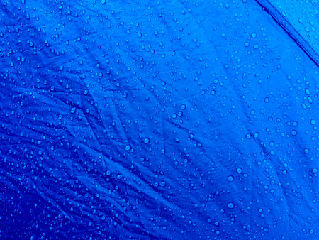Water drops on waterproof membrane fabric. Morning dew on tent.の写真素材