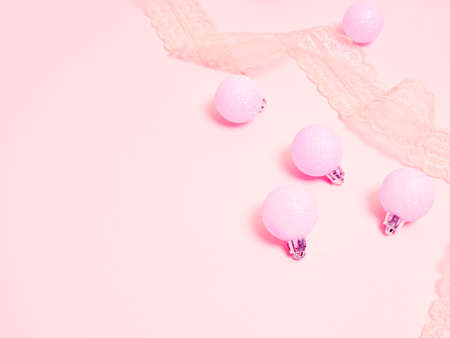 Top view of Christmas composition on pastel pink background. Holiday greeting card with copy space to text.の写真素材