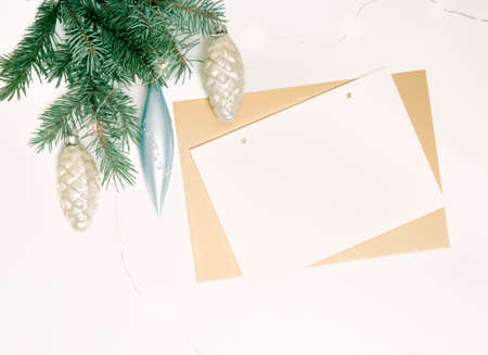 Christmas composition. Fir tree branches, decorations on white background. Flat lay, top view, copy space.の写真素材
