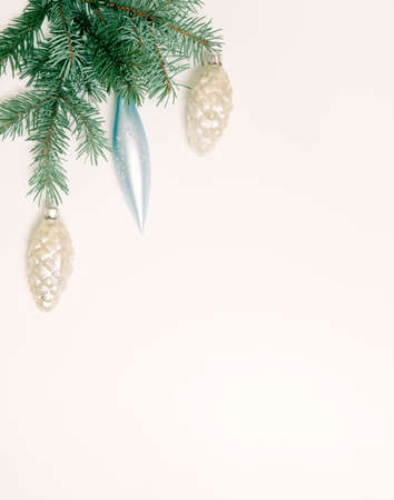 Christmas composition. Fir tree branches, decorations on white background. Flat lay, top view, copy space.の写真素材