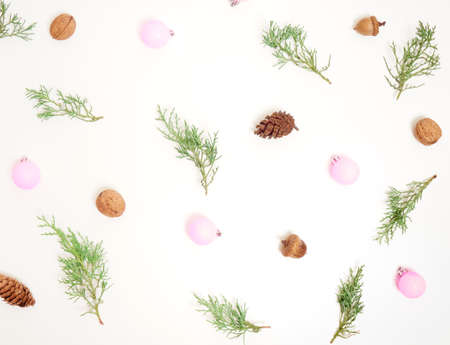 Christmas pattern. New Year decorations on blue background. Thuja, cones and Ñhristmas decorations. Flat lay, top view.の写真素材