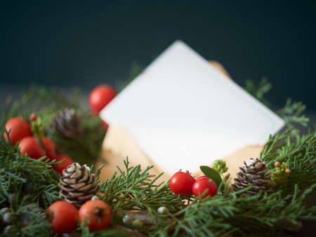 Details of Christmas wreath of fresh spruce, cones and Ñhristmas decorations, close up. New Year decorations.の写真素材