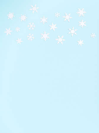 Christmas ornament with snowflakes on blue background.の写真素材