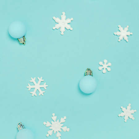 Christmas pattern. New Year decorations on blue background. Snowflakes, Ñhristmas decorations. Flat lay, top view.の写真素材