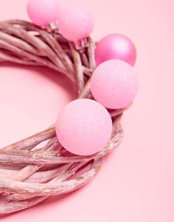Top view of Christmas composition on pastel pink background.の写真素材
