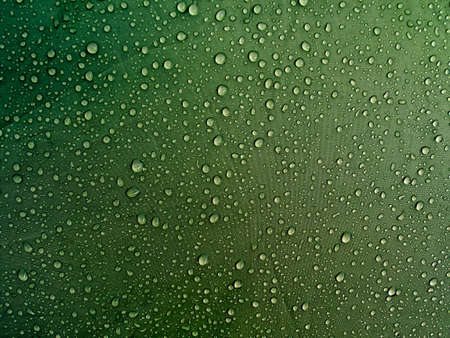 Water drops on waterproof membrane fabric. Morning dew on tent.の写真素材