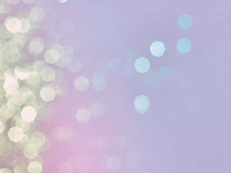 Abstract bokeh defocus glitter blur backgroundの写真素材