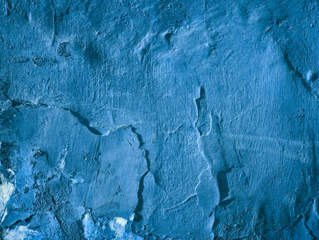 Old cracked paint on the concrete wall.の写真素材