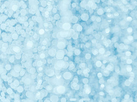 Abstract bokeh defocus glitter blur backgroundの写真素材