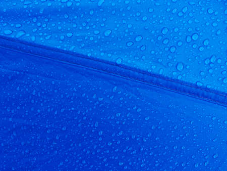 Water drops on waterproof membrane fabric. Morning dew on tent.の写真素材