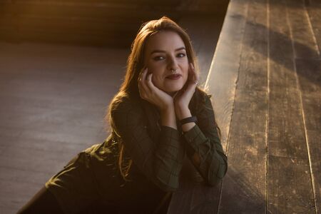 pretty yong woman in soft evening lightの写真素材