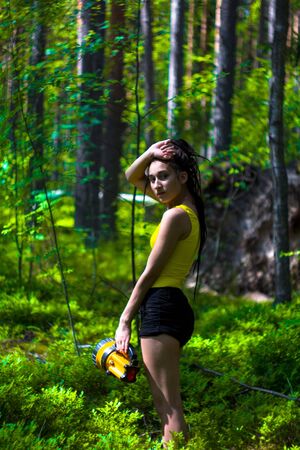 beautiful girl with dreadlocks in summer forestの写真素材