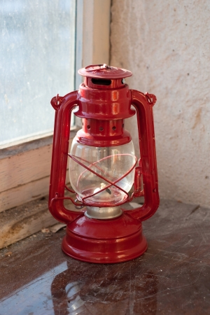 kerosene lamp on the windowsillの写真素材