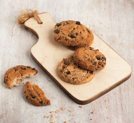 sweet chocolate cookies on the small boardの写真素材