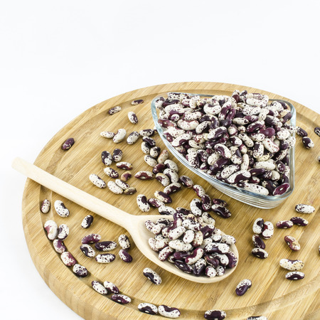 Bean seeds on wooden board. Healthy vegetarian food.の写真素材