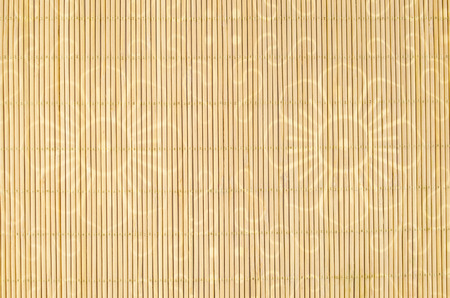 Wood, wicker background with flower motifの写真素材