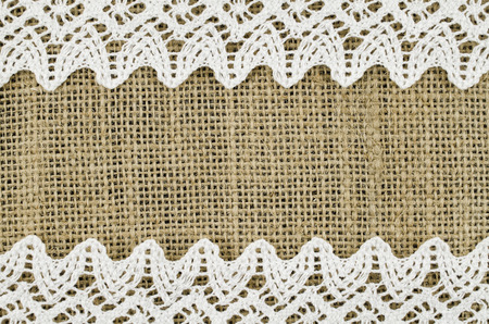 Frame of white napkin on linen backgroundの写真素材