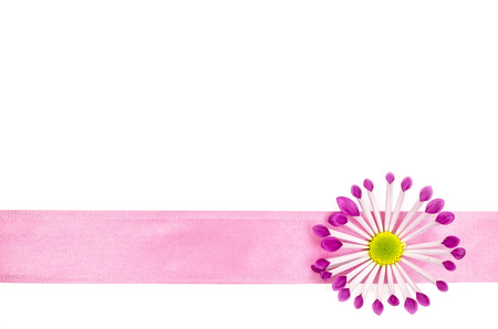 Empty postcard background with pink flower and pink ribbonの写真素材