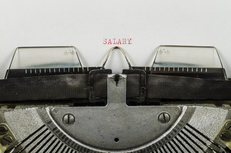 Salary word printed on an old typewriterの写真素材