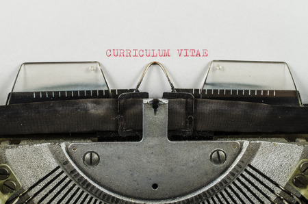 Curriculum vitae word printed on an old typewriterの写真素材