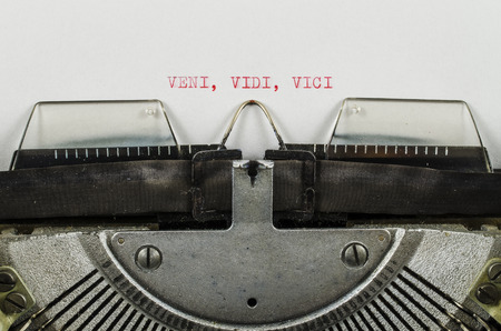 Veni, vidi, vici word printed on an old typewriterの写真素材
