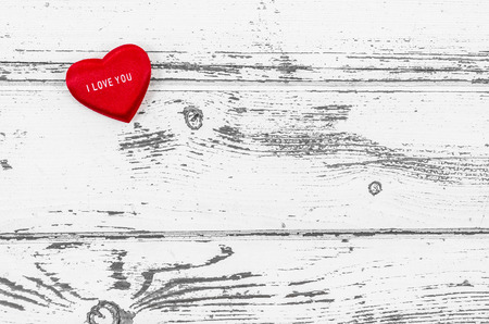 Empty wooden table with heartの写真素材