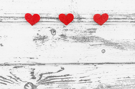 Empty wooden table with heartの写真素材