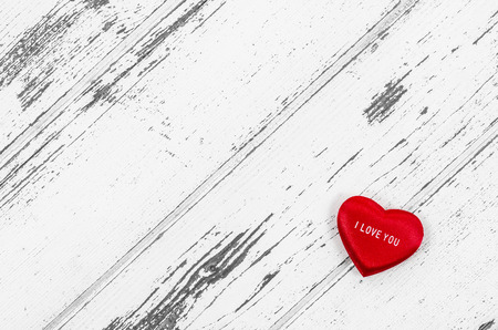 Empty wooden table with heartの写真素材