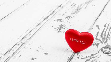 Heart on wooden tableの写真素材