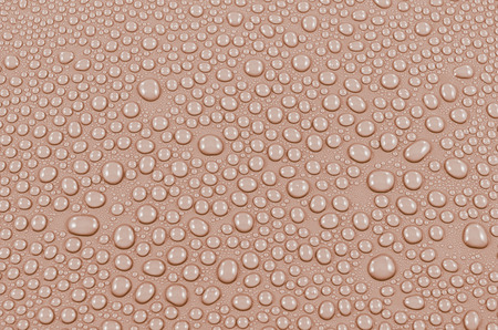 Orange water drops background or texture. Close-upの写真素材
