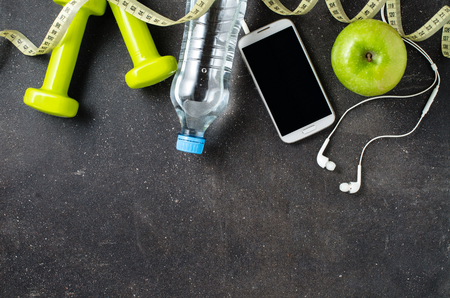 Fitness equipment on dark backgroundの写真素材