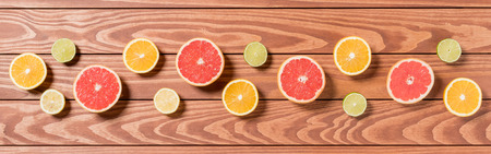 Sliced ??fruits on brown wooden tableの写真素材