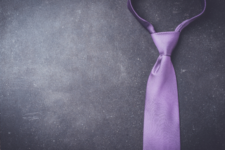 Elegant purple necktie. Top viewの写真素材