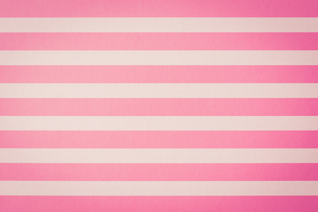 Pink striped paper backgroundの写真素材