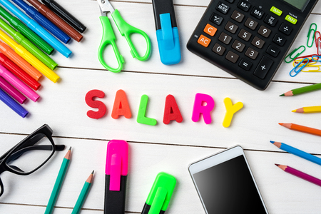 Office desktop with salary wordの写真素材