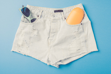 Woman's beach outfit. Summer fashion backgroundの写真素材