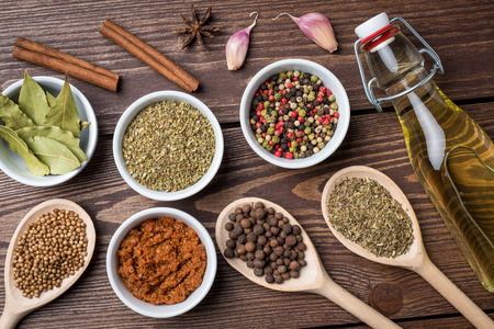 Fresh herbs and spices on wooden table. Close upの写真素材