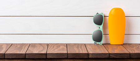 Beach accessories on wooden backgroundの写真素材