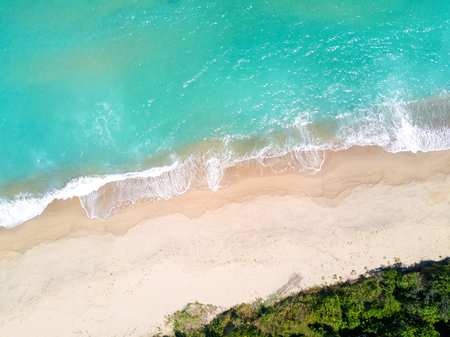Aerial view of sandy beach and ocean