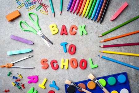School supplies on stone background. Back to school conceptの写真素材